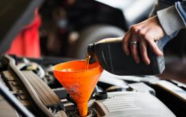 Image of adding motor oil to vehicle