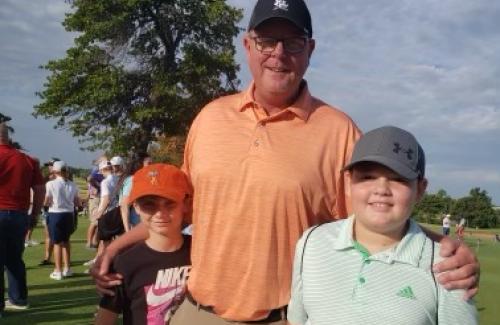 Midwest City Golf Director Larry Denney with Junior Golfers