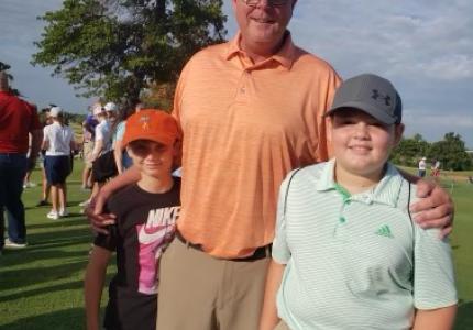 Midwest City Golf Director Larry Denney with Junior Golfers