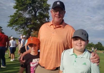 Midwest City Golf Director Larry Denney with Junior Golfers