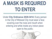 Sign with Two White Surgical Type Masks