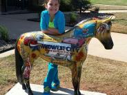 Young Girl Posing with a Midwest City Pony