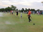 Guests Tee Off On Driving Range