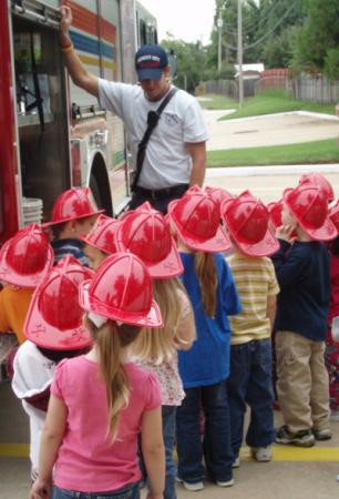 Fire Fighter Teaching Children