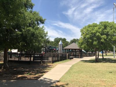 Wooden playground surrounded by trees at Regional Park