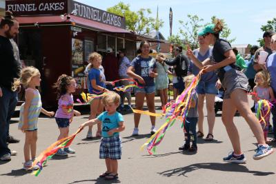 Children dancing with streamers