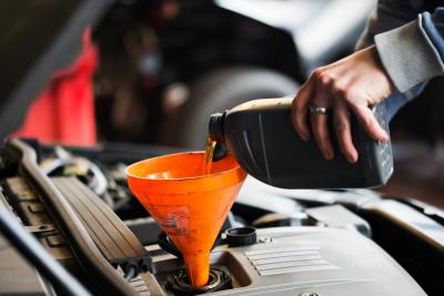 Image of adding motor oil to vehicle