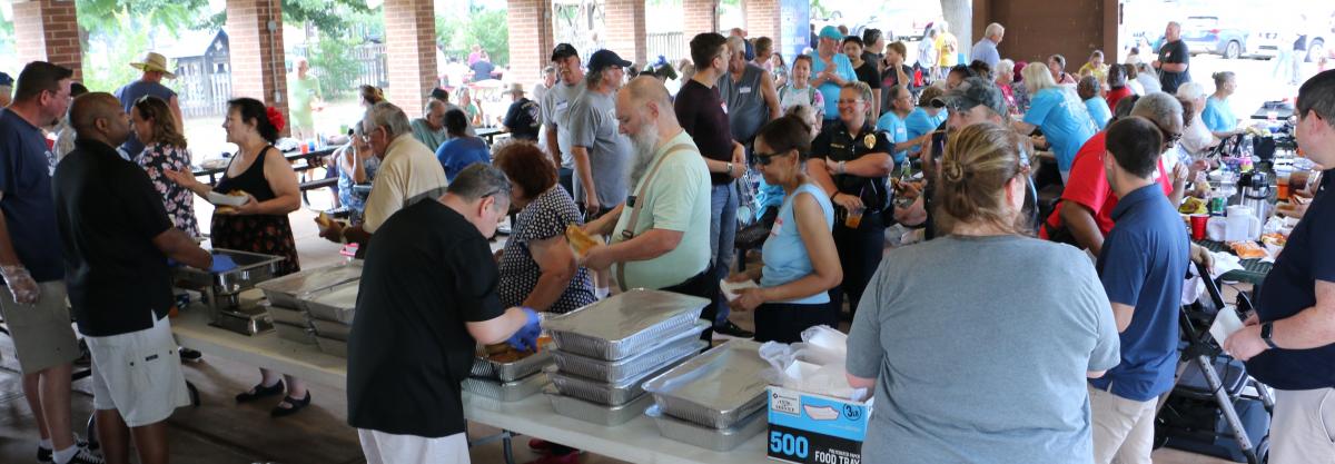 Neighborhood Services staff serves attendees at 2023 Association Celebration