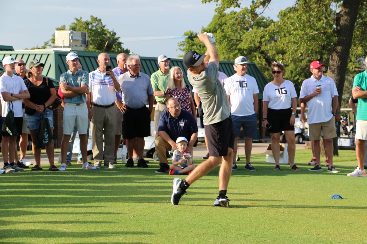 Talor Gooch tees off at John Conrad Grand Reopening